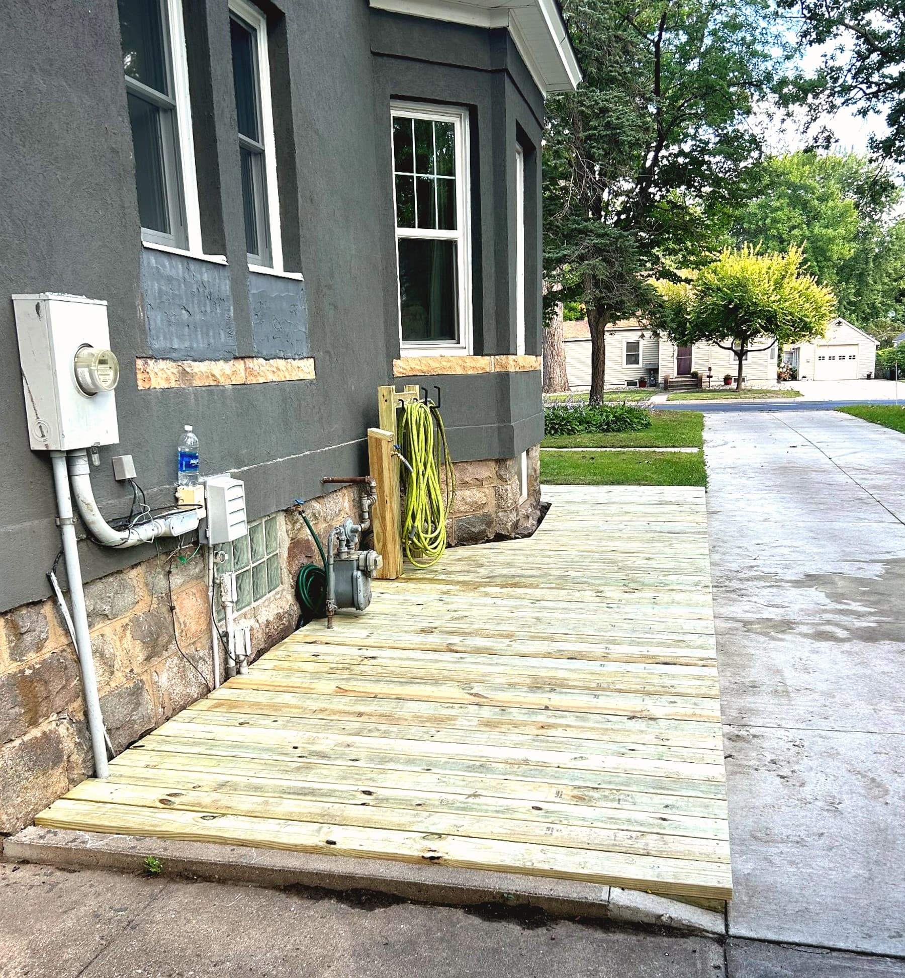 Luxury tropical patio design - Outdoor living spaces built by Finesse Carpentry near Annandale and Hutchinson MN